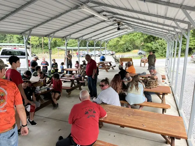 Young shooters and families under the picnic shelter at Annual Youth Day. Tri-Angle Sportsmen's Club, Bluefield, Virginia